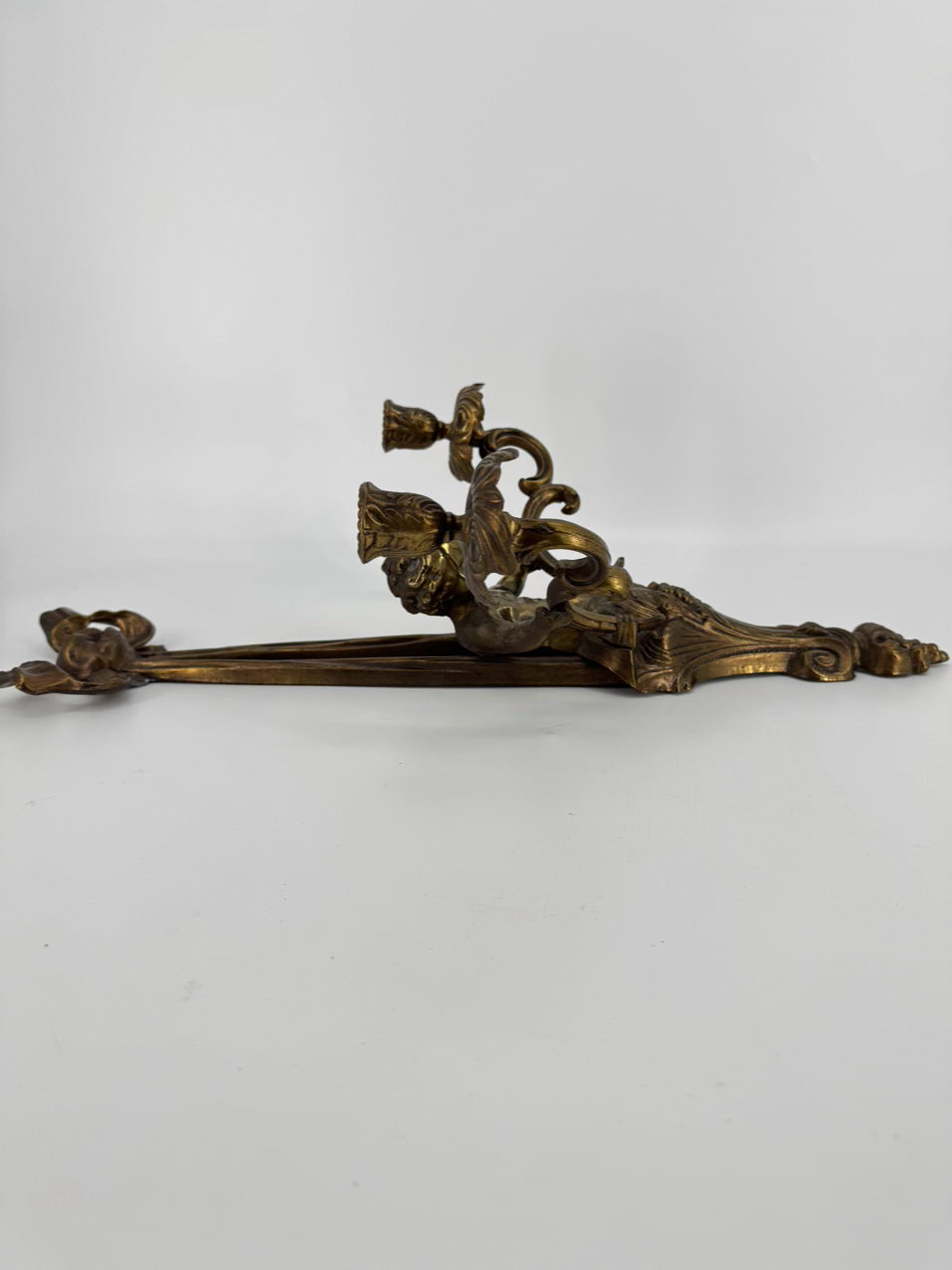 Brass Cupid & Bow Candle Sconce