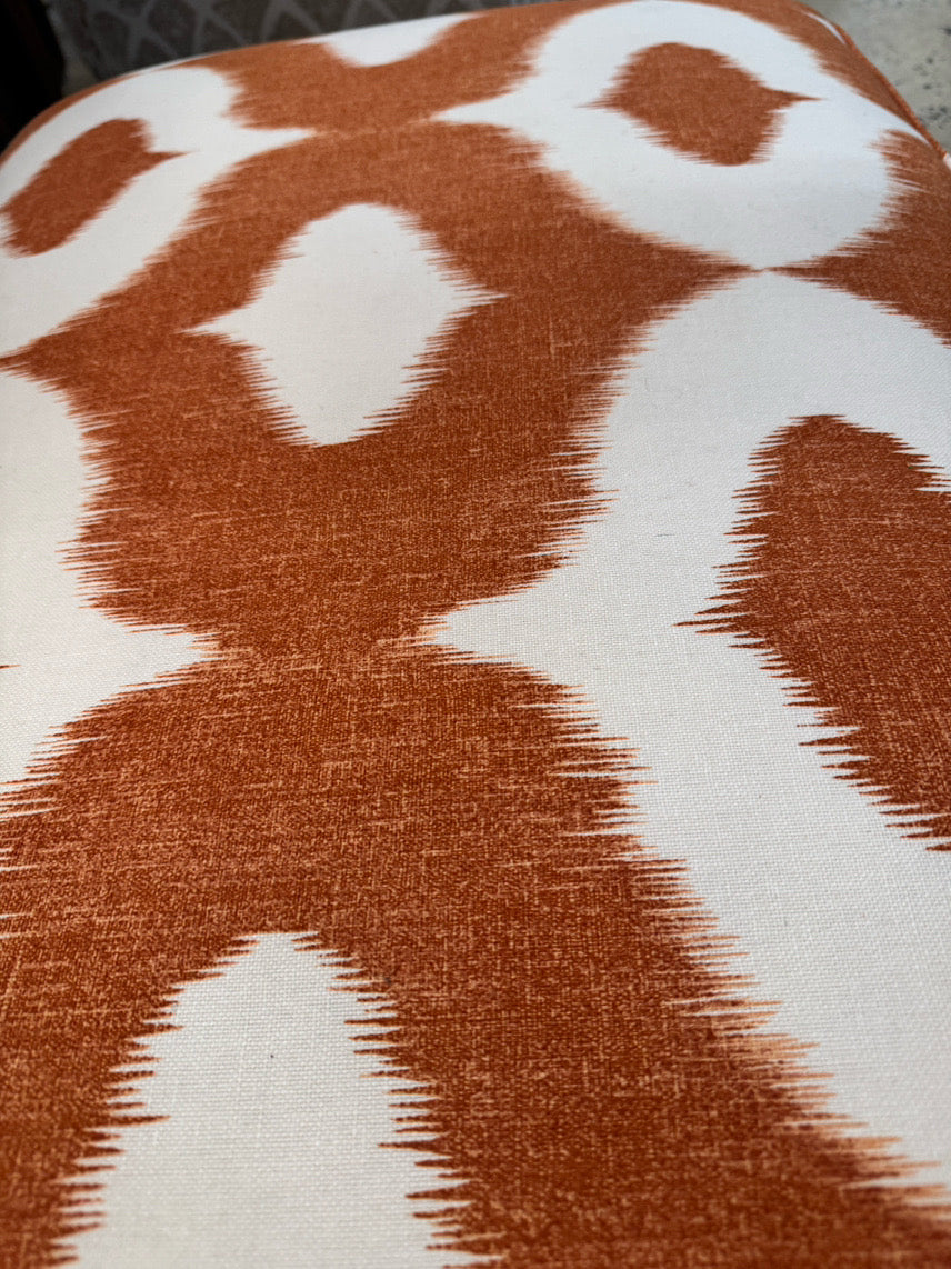 Orange & White Geometric Upholstered Ottoman on Casters