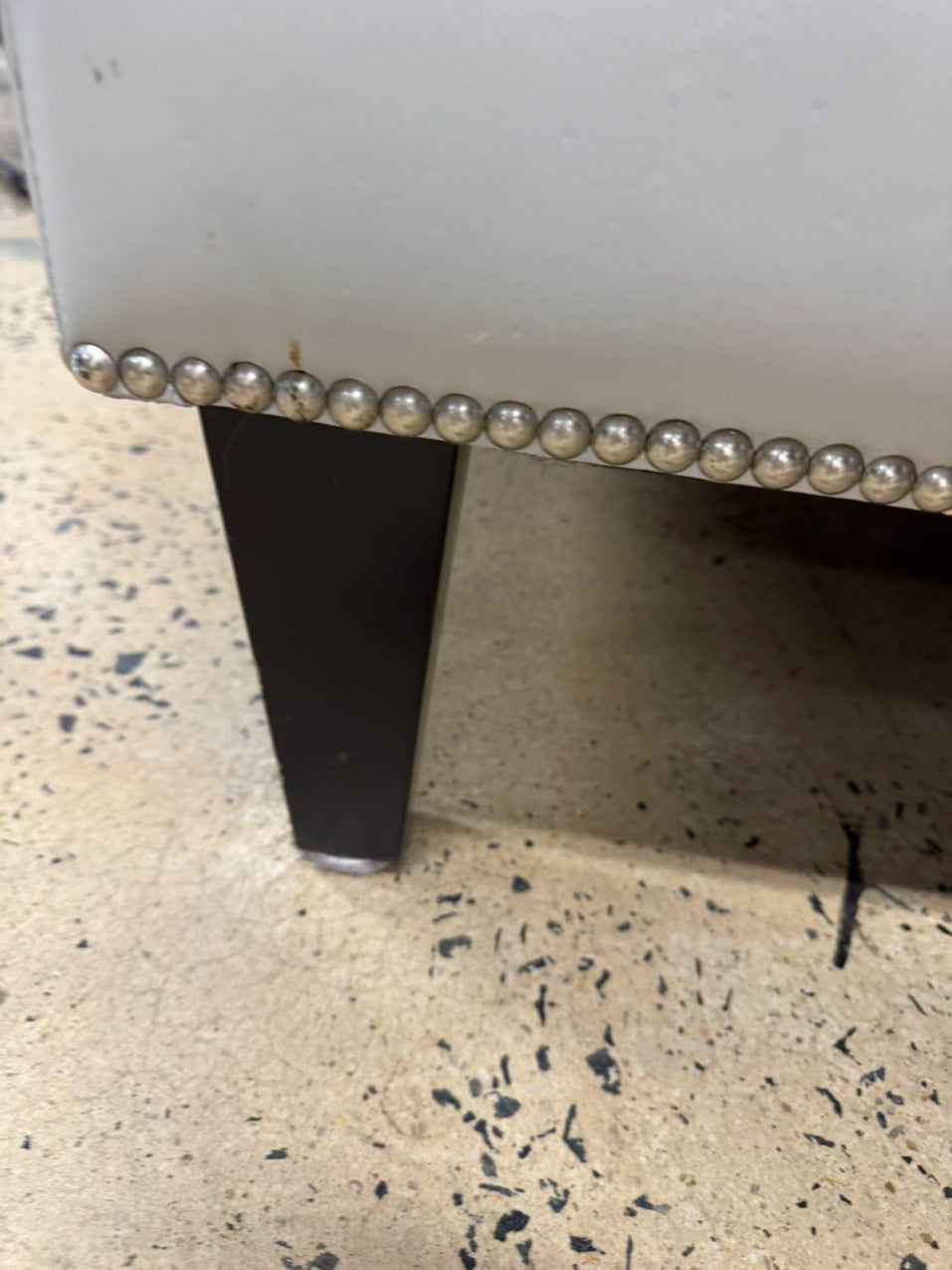 Gray Leather Look Tufted Ottoman
