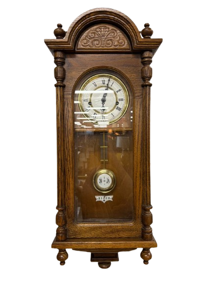 HOWARD MILLER Medium Oak Wall Clock
