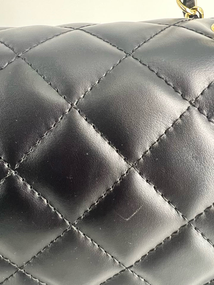 BORSE IN PELLE Black Leather Quilted Purse