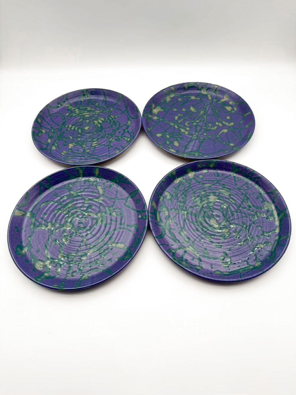 ROBIN BLOOM Purple & Green Pottery Set Of 4 Plates