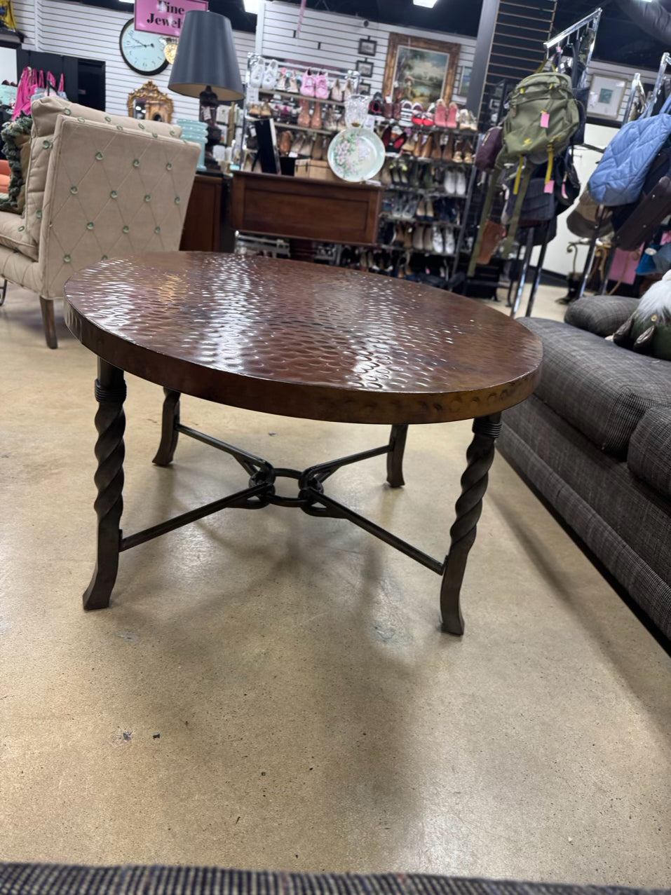 Copper Look Oval Dented Coffee Table