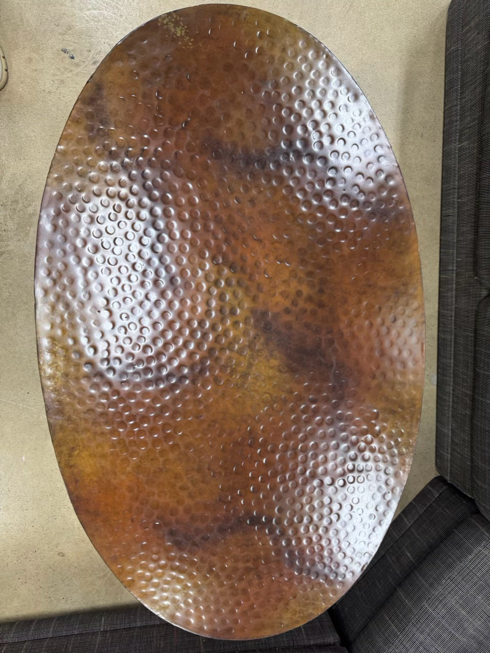 Copper Look Oval Dented Coffee Table