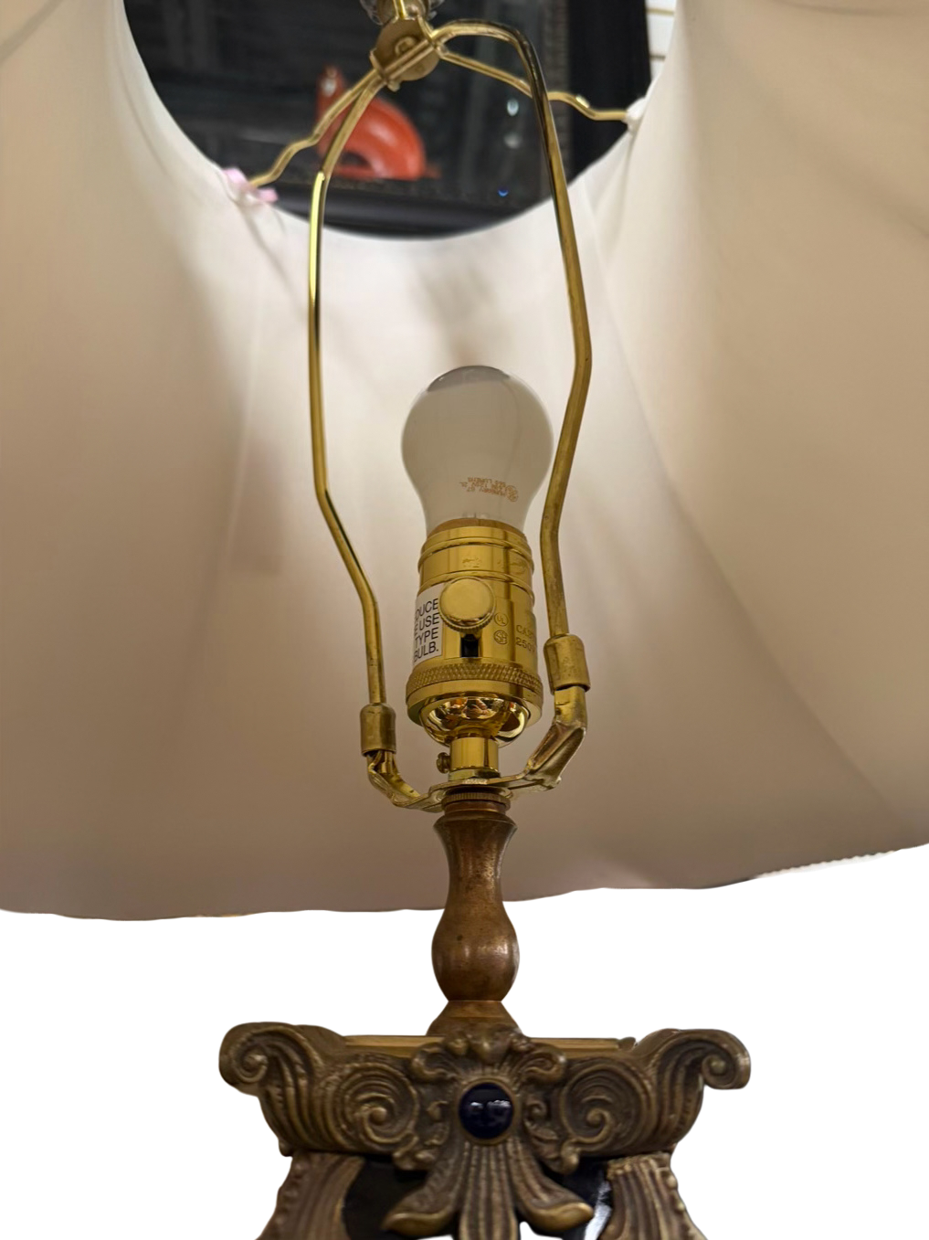 CASTILLIAN IMPORTS Black & Gilt Cast Metal Neo Classical Pair Of Rams Heads Lamps w/ Cream Silk Shades