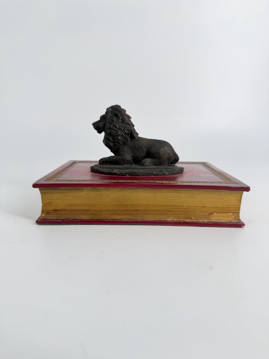 Brown, Red & Bronze Lion Figure