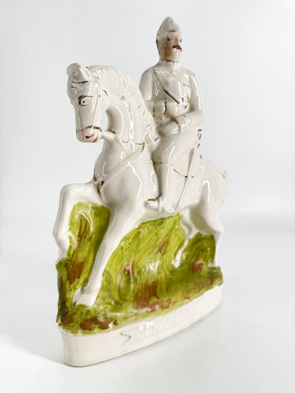 White & Green Ceramic Handpainted Staffordshire General French Figurine