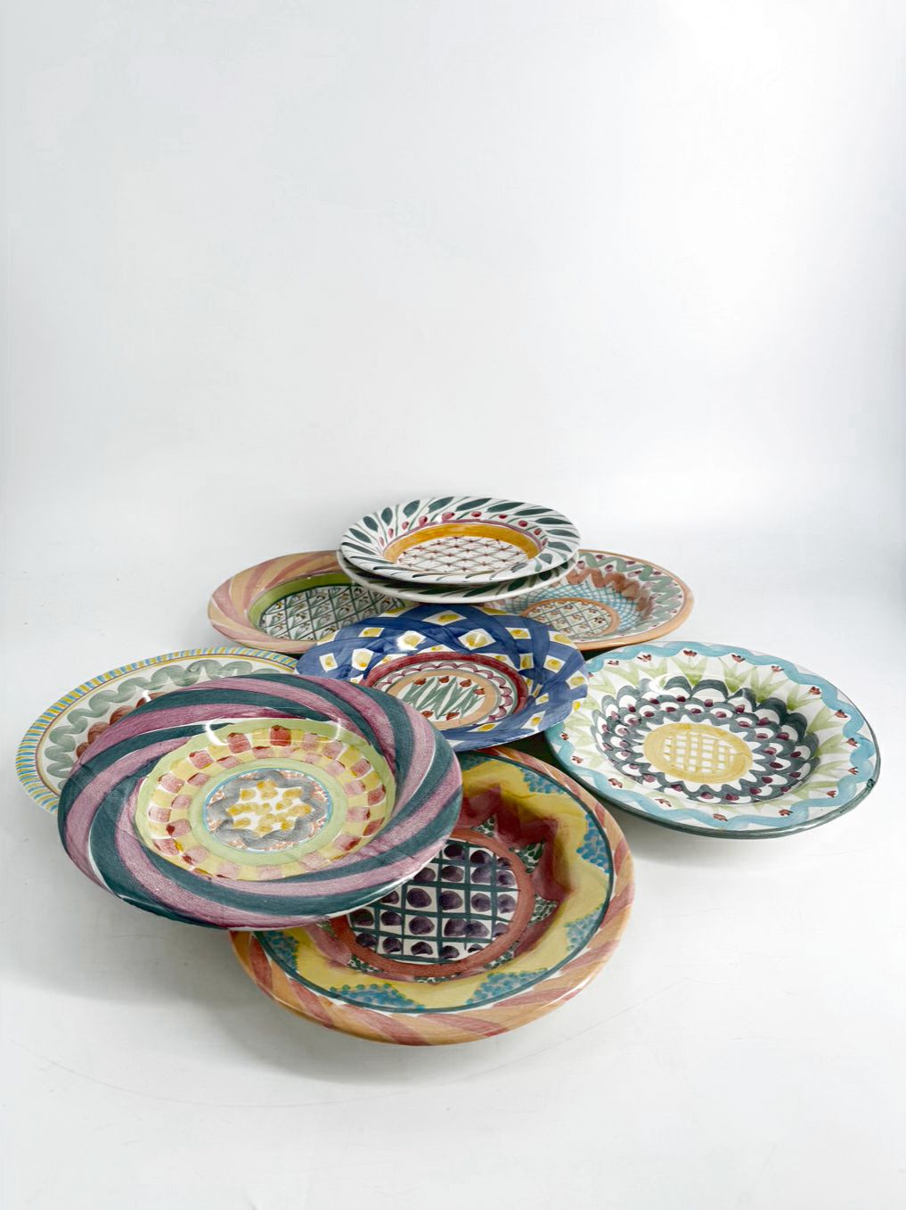 MACKENZIE CHILDS Multicolored Hand painted Pottery Set Of 9 Plates